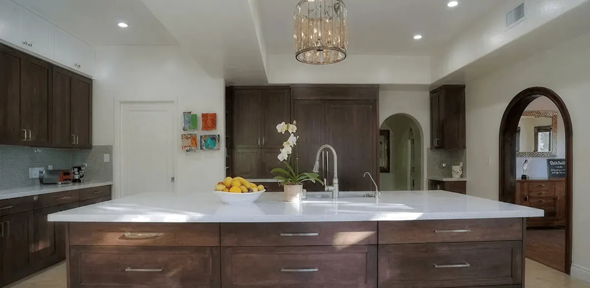 Cabinet refacing project with updated kitchen cabinets and island in Honolulu, HI
